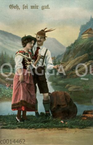 Junger Mann und junge Frau in bayerischer Tracht vor Bergsee (vielleicht Königgsee)