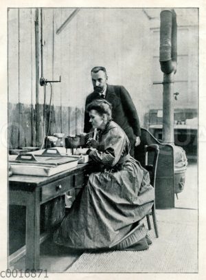 Marie Curie und Pierre Curie in ihrem Labor