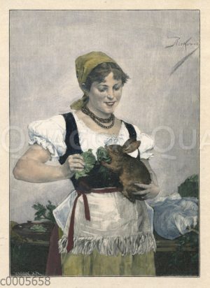 Mädchen füttert Kaninchen mit Salat