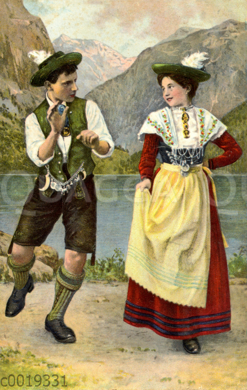 Mann und Frau beim Schuhplattler-Tanz